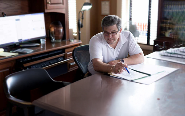 Attorney John L. Gormley sitting in office